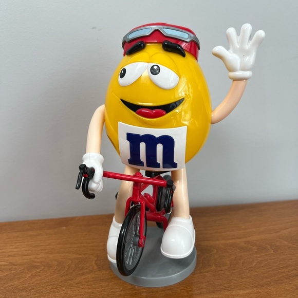 M&M'S Dispenser Yellow M&M On Bicycle Novelty Collectible - Picture 1 of 7